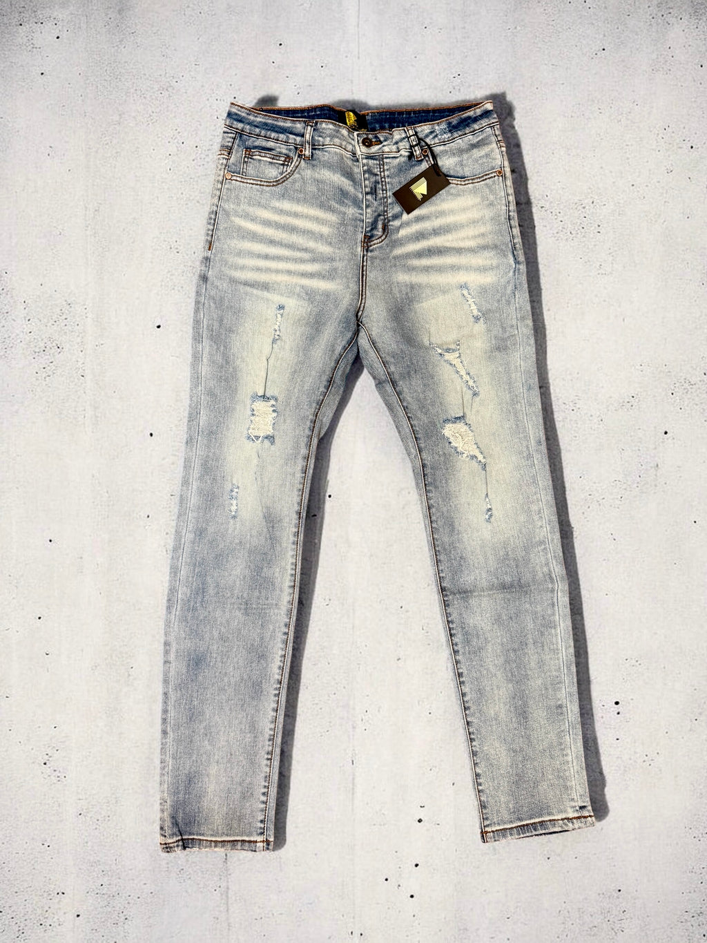 Light Wash Distressed Denim (Slim Tapered)